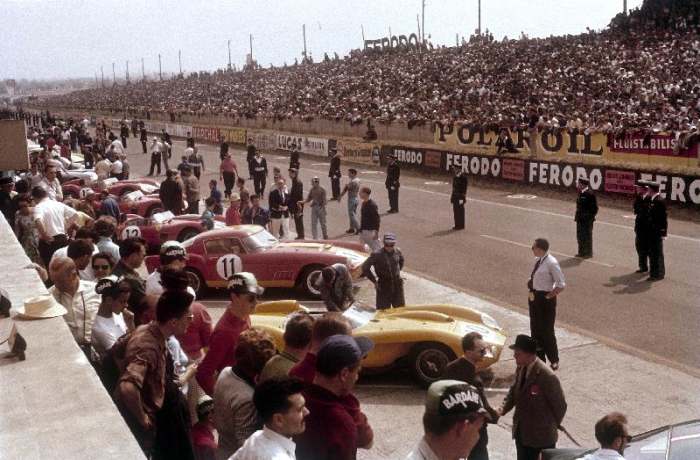Le Mans racing circuit, France. The cars are lined up in the pits, with the spectator stands opposit de 