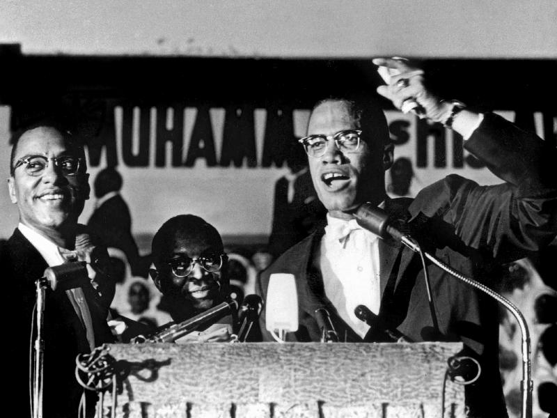 Malcolm X during a speech during a rally of Nation of Islam at Uline Arena, Washington, photo by Ric de 