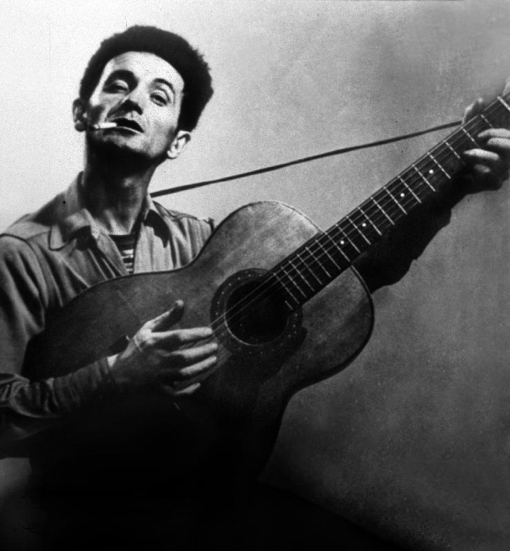 Musician Woody Guthrie considered as the father of folk music de 