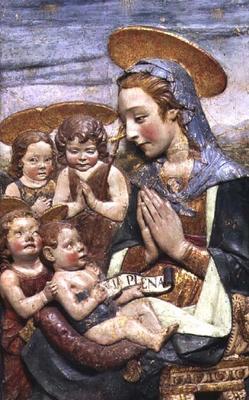 Madonna and Child with three cherubs, bas relief by Antonio Rossellino (1427-79) (tin glazed earthen de 