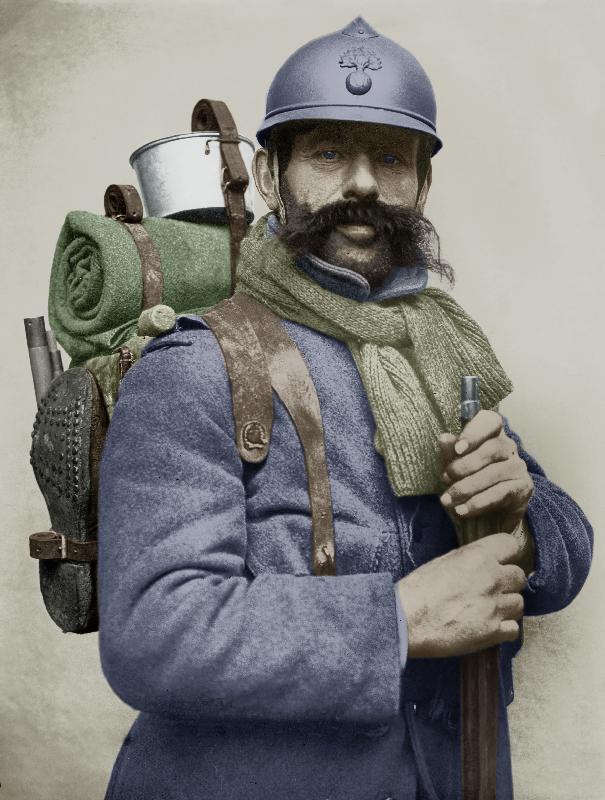 Portrait of a French soldier dressed with his sky blue military uniform and carrying a backpack, wit de 