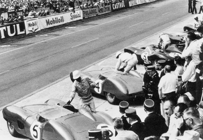 Start of the Le Mans 24 Hours, France, 1959. Roy Salvadori prepares to climb aboard his Aston Martin de 