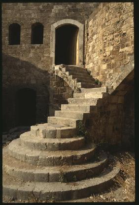 The castle of Saint-Gilles, detail, view of a stair (colour photo) 