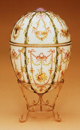 The Kelch Bonbonniere Egg Shown In A Gold Egg-Stand Of Scroll Design, By Faberge 1899-1903