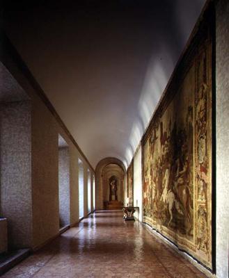 The main corridor on the piano nobile decorated with hanging tapestries, designed by Antonio da Sang de 