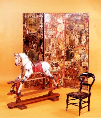 Victorian Nursery furnishings. Late 19th century rocking horse, mid-19th century scrapwork screen an de 