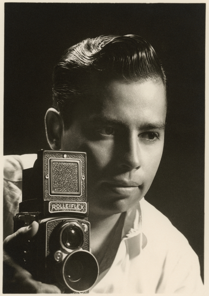 Orlando Suero portrait with Rolleiflex camera, c de Orlando Suero