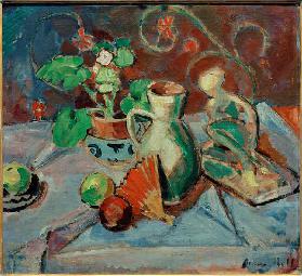 Still life with a white pitcher, plastic, fans and oranges