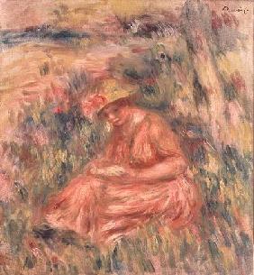 Woman seated on the grass