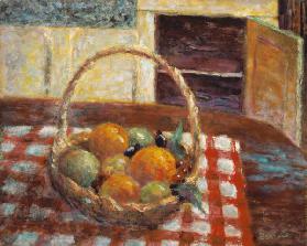 Basket of fruit on a table