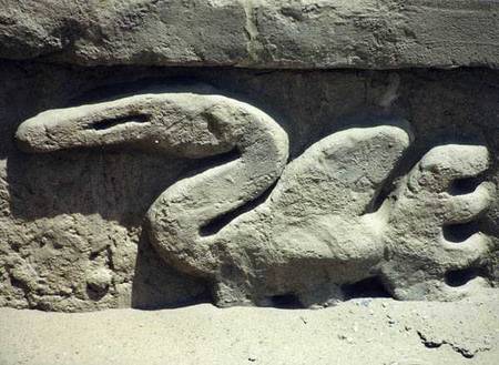 Bird design on one of the walls inside the ruined pre-Inca city, built by the Chimu de Pre-Columbian