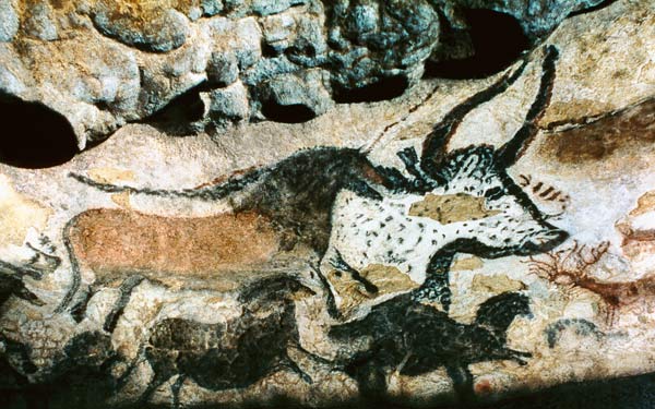 Rock painting of a bull and horses de Prehistoric