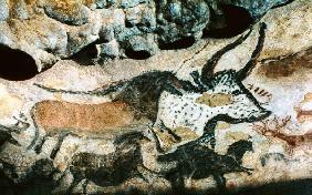 Rock painting of a bull and horses