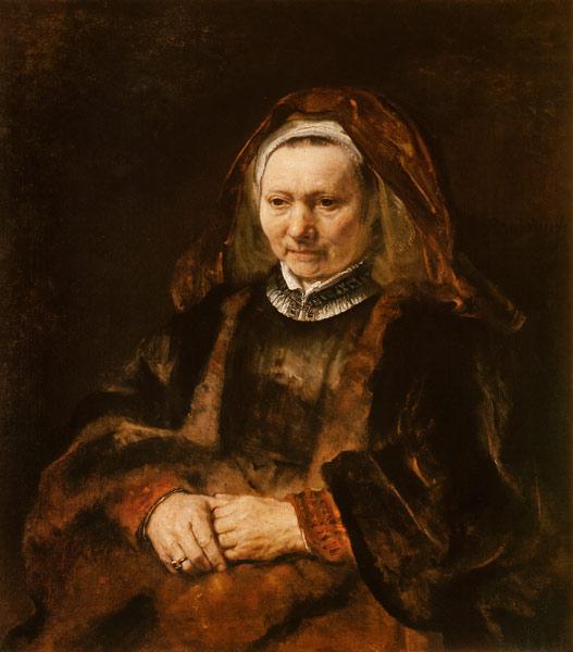 Portrait of an old woman with fanfolded hands
