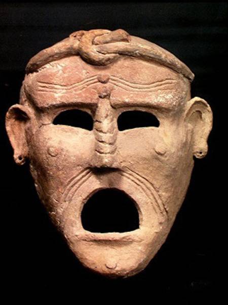 Punic charm mask de Roman