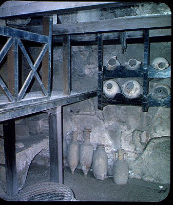 Interior of a shop with amphorae, from the House of Neptune and Amphitrite (photo) de Roman 1st century AD