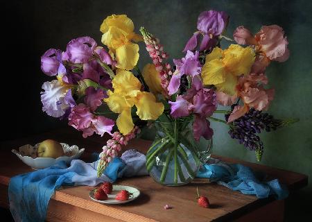Still life with a bouquet of irises and lupine
