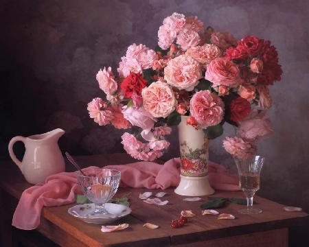 Still life with a bouquet of roses and wine