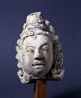 1967-1 Crowned head of a deity surrounded