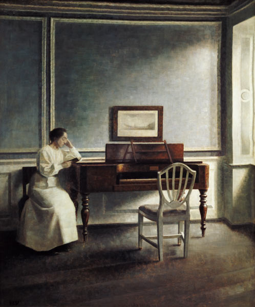 Woman, reading next to a piano in a book. de Vilhelm Hammershoi