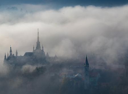 Dense fog over old town